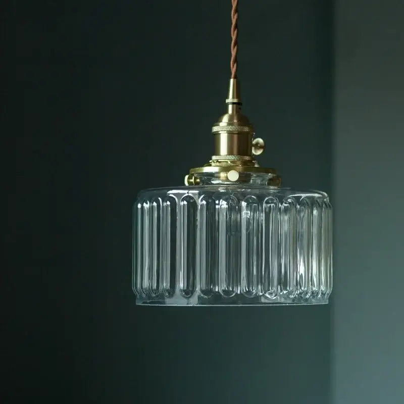 Vintage ribbed clear glass led pendant light with vertical ridges and brass finished metal fixture for kitchen decorbites clear glass