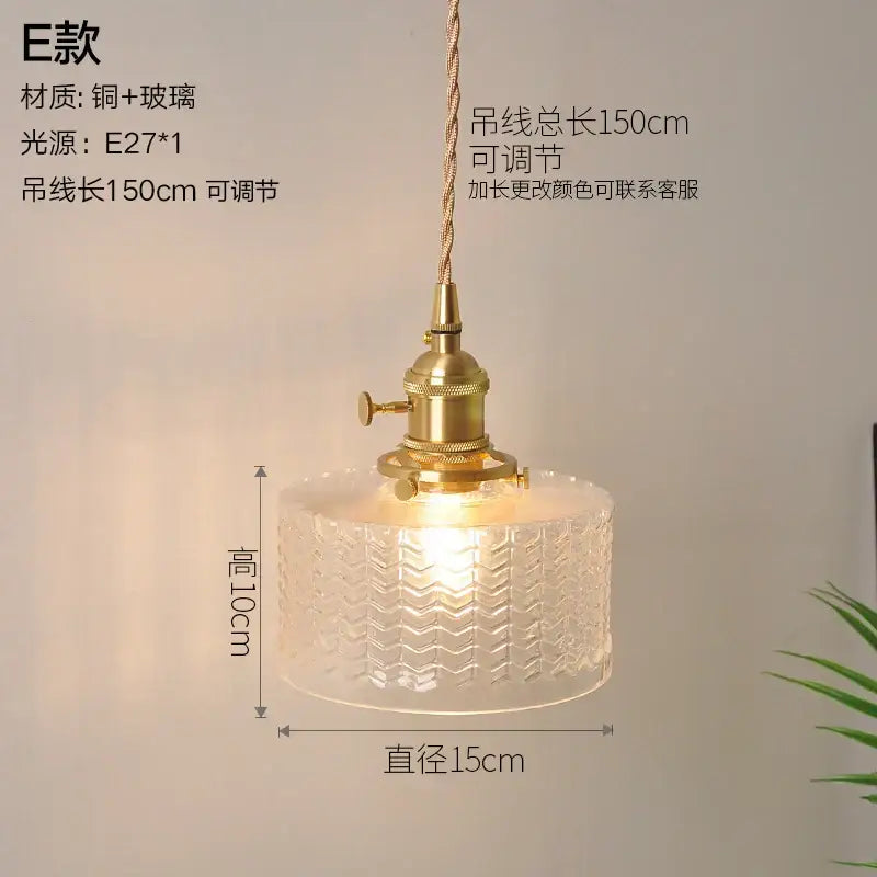 Vintage ribbed glass copper pendant light with clear textured shade and brass-finished copper pendant light fixture