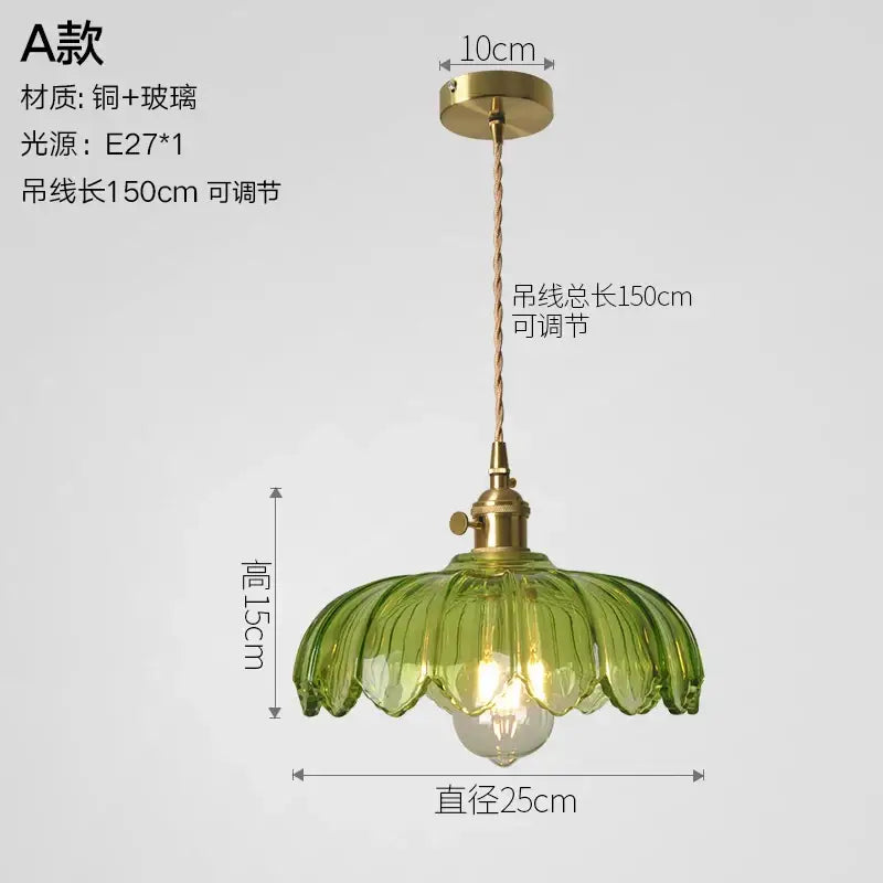 Vintage ribbed glass copper pendant light with green petal-shaped shade and brass fixture for kitchen dining room