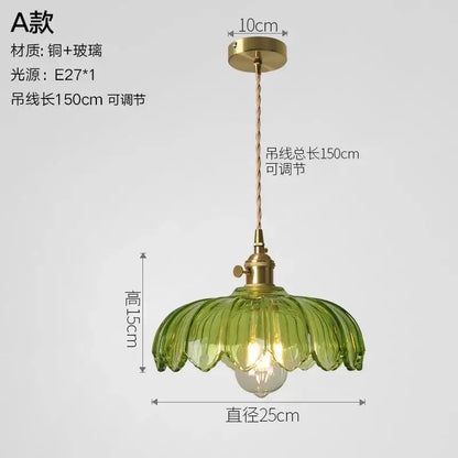 Vintage ribbed glass copper pendant light with green petal-shaped shade and brass fixture for kitchen dining room