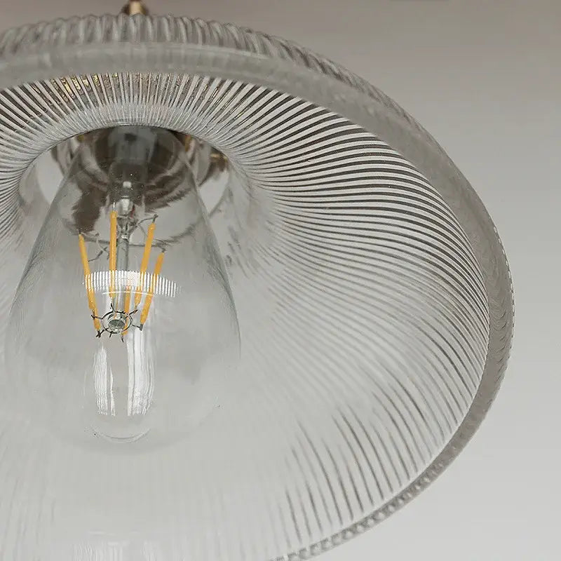 Vintage ribbed glass copper pendant light with textured shade and exposed led filament bulb for kitchen dining room