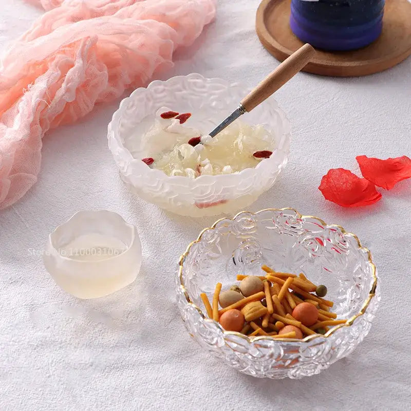 Vintage rose etched glass salad bowl with gold rim filled with colorful snack sticks for dining room use