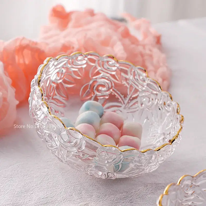 Vintage glass salad bowl with intricate rose etchings and a delicate gold rim for elegant dining room use