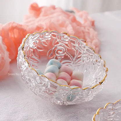 Vintage glass salad bowl with intricate rose etchings and a delicate gold rim for elegant dining room use