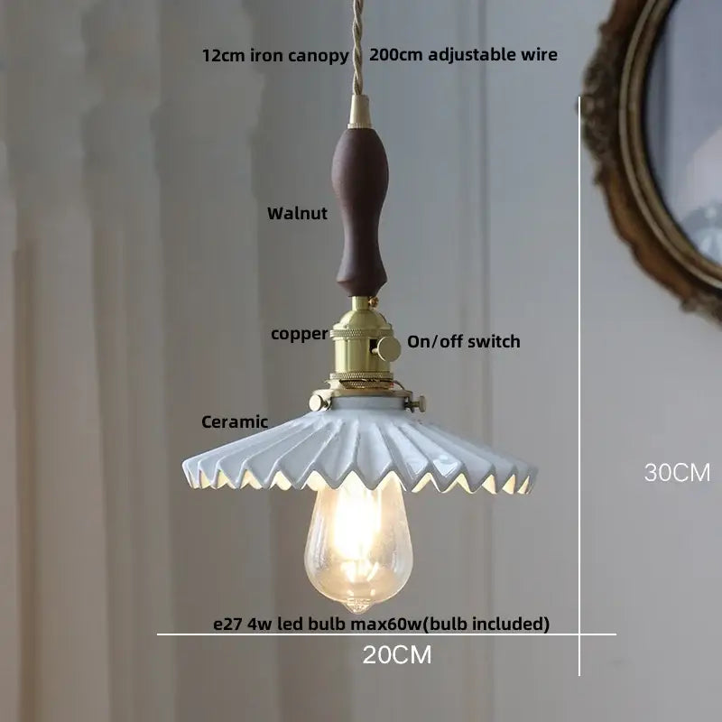 Vintage scalloped ceramic pendant light fixture with walnut wood handle and brass hardware for dining room use