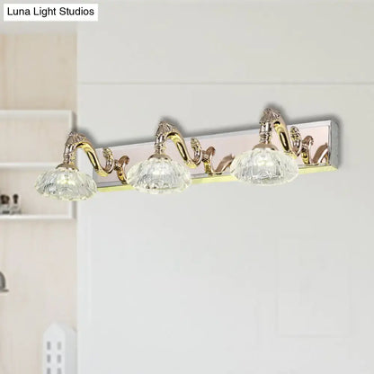 Elegant three-light gold finish wall lamp with faceted crystal shades on silver base for 110v-120v bathroom vanity use