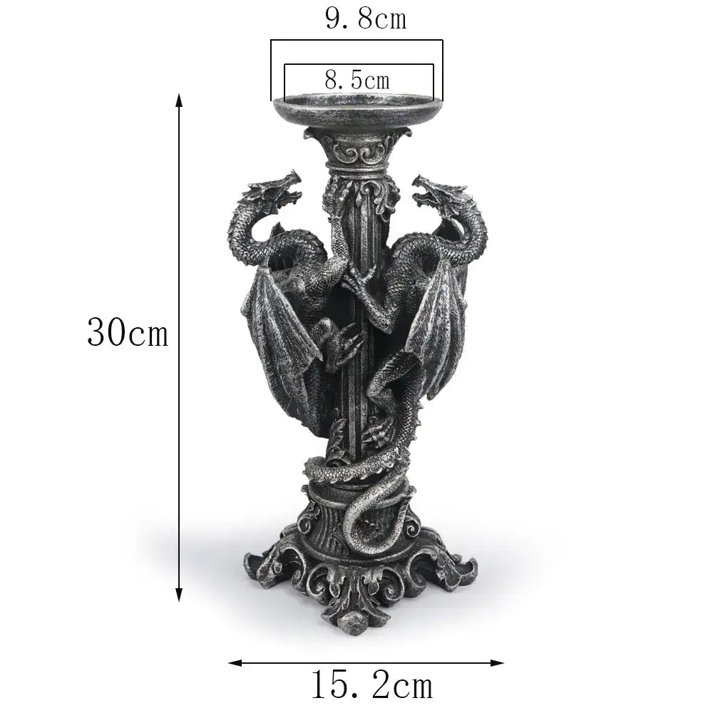 Vintage silver dragon candlestick sculptures featuring two dark metallic dragons coiled on a 30cm ornate candlestick