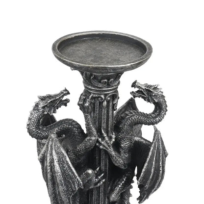 Dark metallic vintage silver dragon candlestick sculptures featuring two detailed dragons coiled around a column base