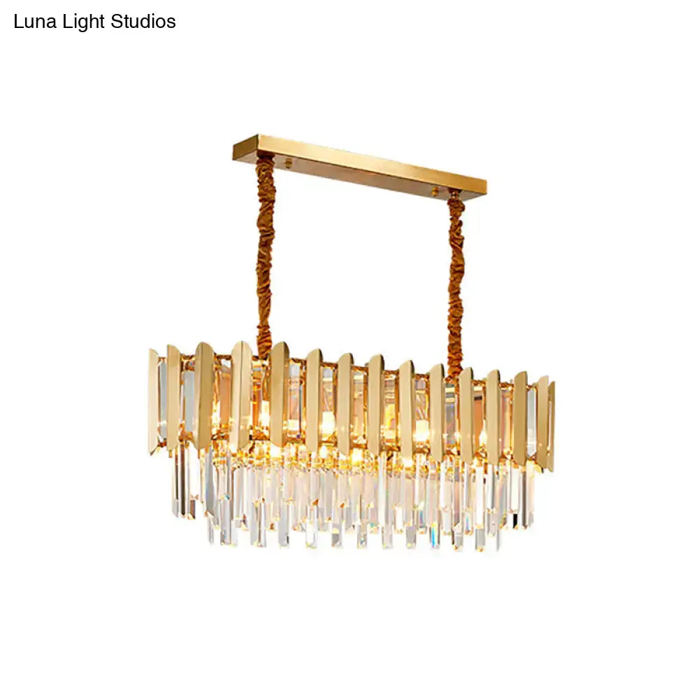 Gold-toned brass finish multi light pendant chandelier with vertical crystal bars and vintage style clear prisms