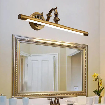 Antique brass-finished vintage style wall light with elongated rectangular led bar and ornate decorative fixtures for vanity use