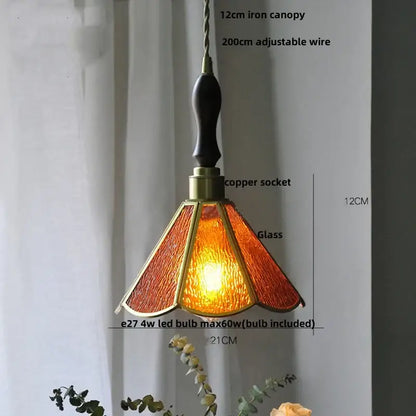 A vintage amber stained glass pendant light with brass frame and wooden handle for decorbites blue glass led decor