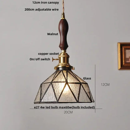 Vintage teal blue glass led pendant light with dark walnut handle brass accents and geometric textured shade decorbites blue glass