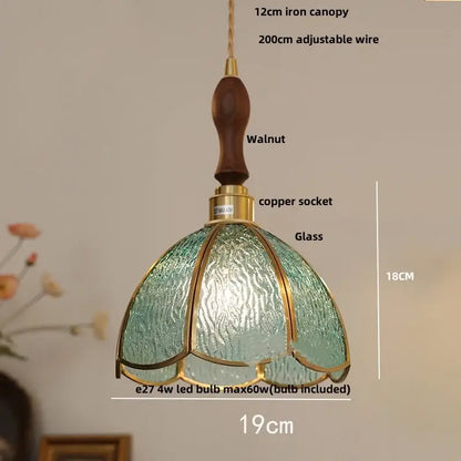 Vintage walnut and green glass pendant light featuring a teal textured glass shade with brass accents by DecorBites led wood walnut