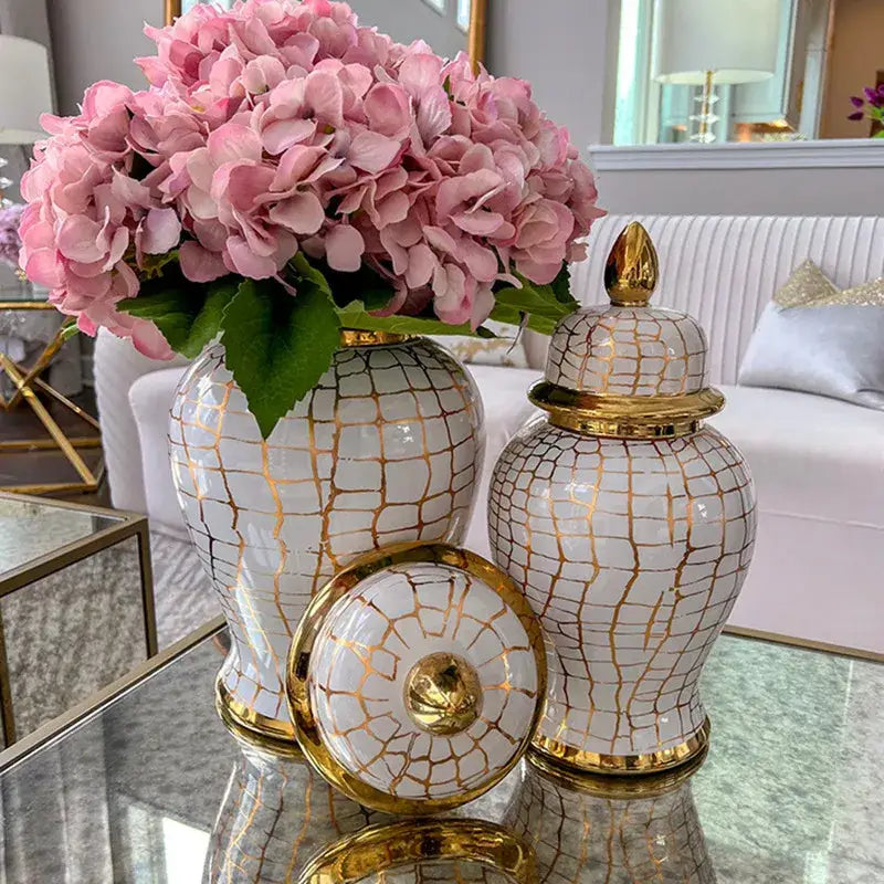 Vintage white ceramic checkmate jar with gold leopard print and lids decorated with pink hydrangeas for living room decorbites leopard print