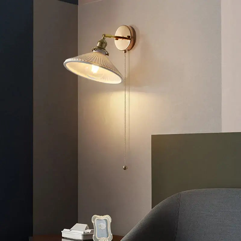 Antique brass wall sconce with white ribbed glass shade and adjustable pull-chain decorbites ceramic canopy led light