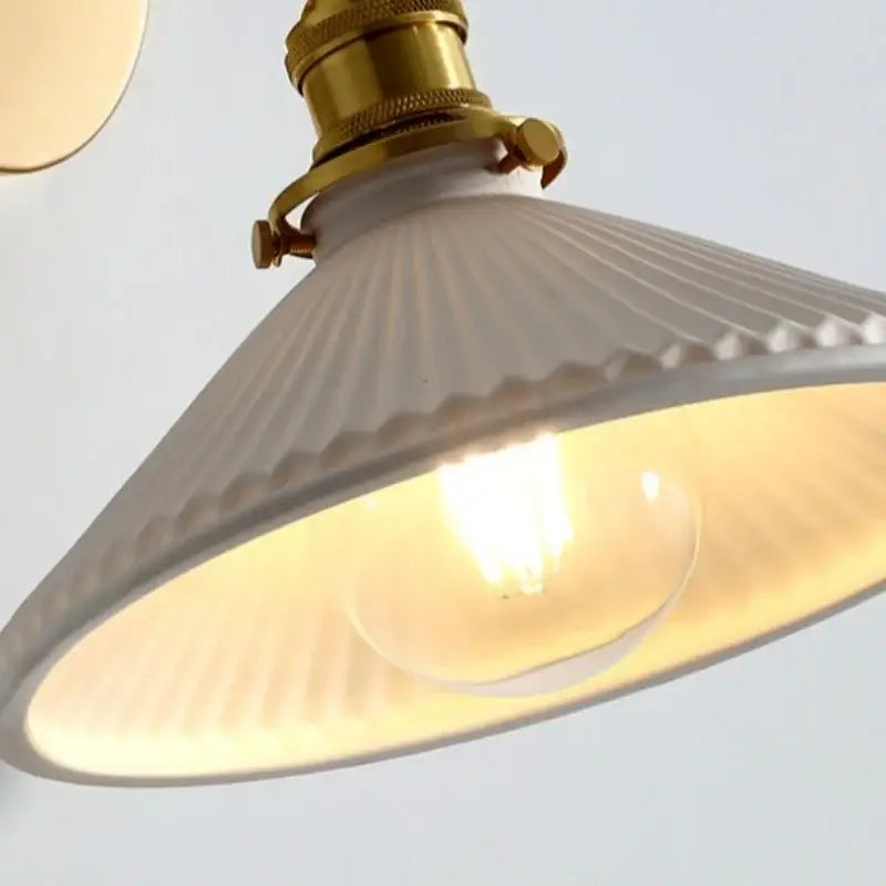 Vintage white ceramic canopy led wall sconce with ribbed design brass fixture and exposed bulb for bedroom decorbites ceramic canopy