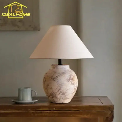 Cream-colored ceramic led table lamp with textured finish and soft white shade for vintage bedroom decorbites ceramic led use