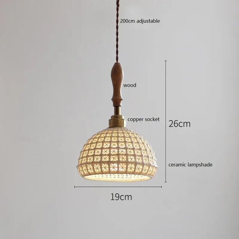 A warm-toned vintage woven rattan ceramic led pendant light with wooden handle and copper socket for dining room decor