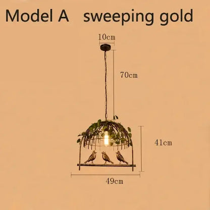 Vintage wrought iron gold bird cage chandelier with intricate metalwork and greenery accents for living room decorbites bird cage