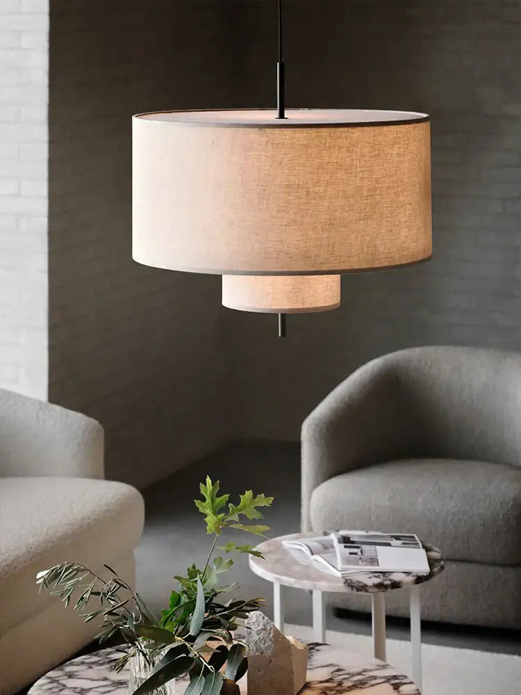 Beige linen drum pendant lamp with minimalist black metal frame for dining room decorbites bohemia wabi sabi decor