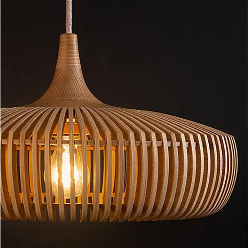 Wabi-sabi brown ribbed wood pendant light with vertical slats and exposed bulb as warm living room light source