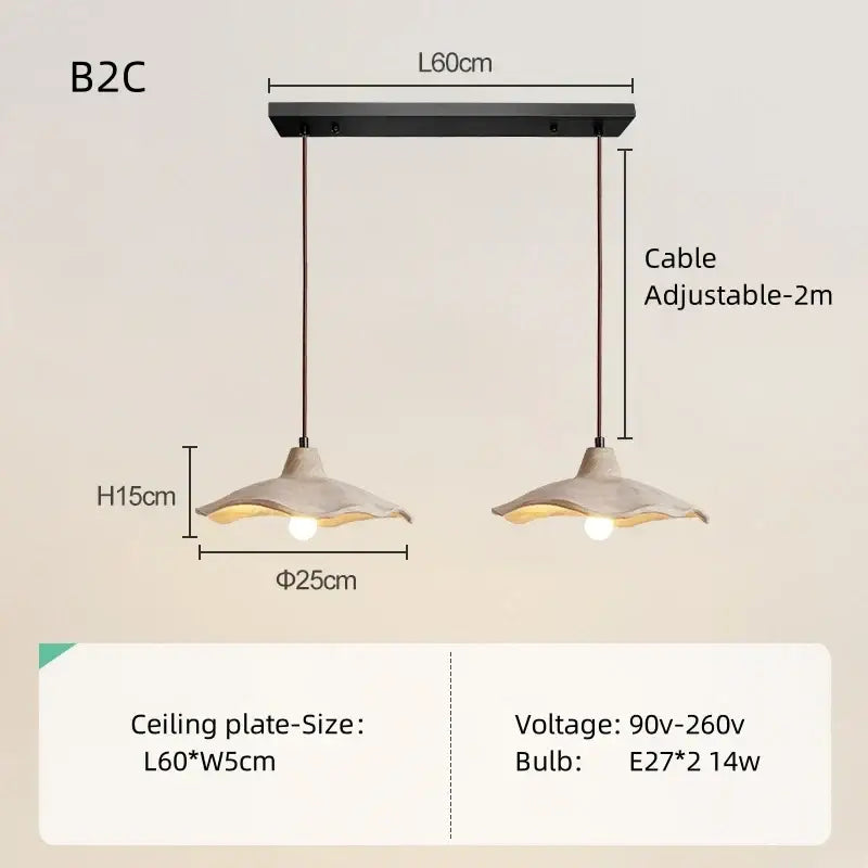 Black metal pendant light with two adjustable concrete-textured shades and natural wood accents for dining room