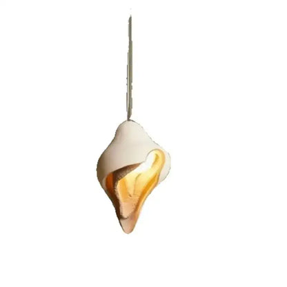 Wabi sabi cream gypsum pendant lamp with a seashell design and warm amber glow for living room pendant light