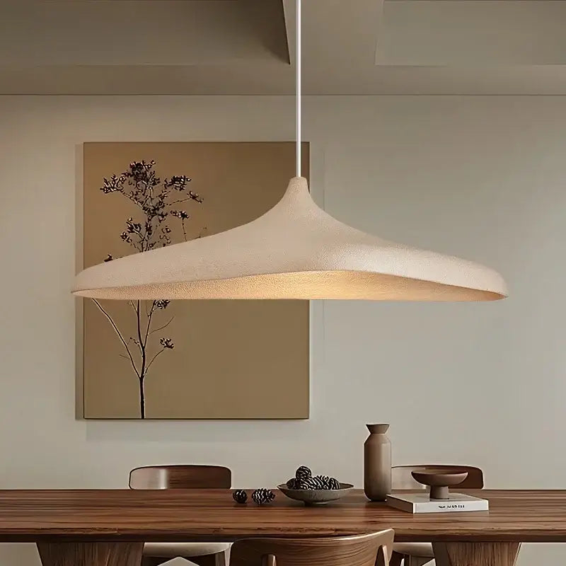 Wabi sabi cream high polymer pendant light with textured dome and slender cord ideal for dining room lighting
