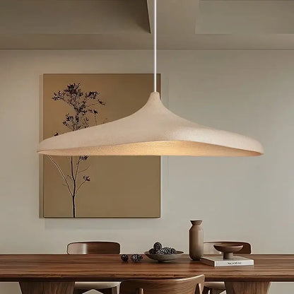 Wabi sabi cream high polymer pendant light with textured dome and slender cord ideal for dining room lighting