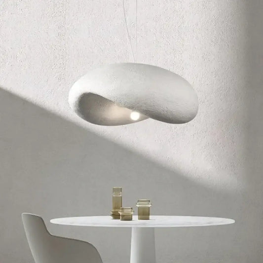 A sleek off-white wabi sabi cream style led chandelier with a smooth organic form and soft diffused glow for living room decorbites cream style