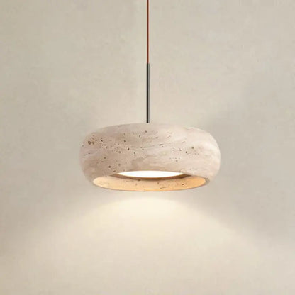 Wabi-sabi off-white stone pendant light with textured body and warm wooden inner ring for dining room lighting