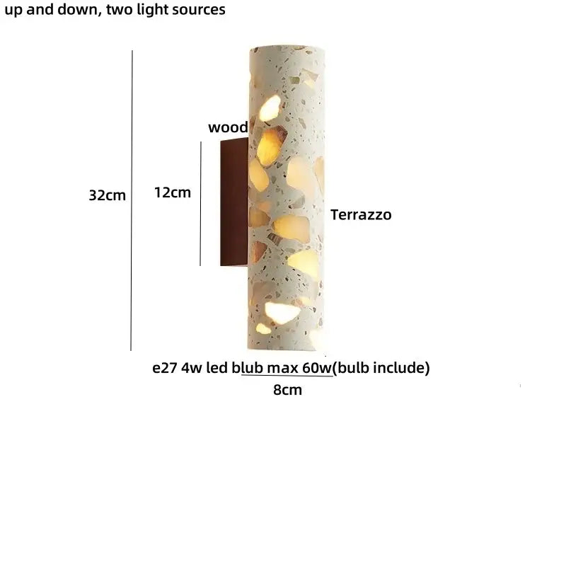 A cylindrical wabi sabi terrazzo and wood led wall light with textured light gray surface and golden stone fragments for bedroom decorbites led wall lights