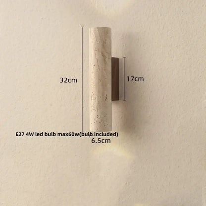 A sleek cylindrical wabi sabi terrazzo and wood led wall light with beige veined stone on a dark bronze bracket
