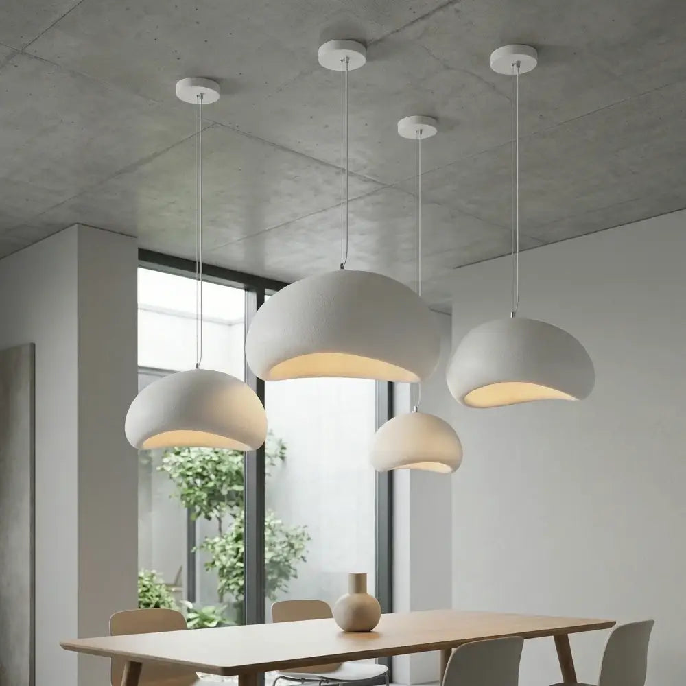 Modern white pendant light with matte finish made of high-density polystyrene featuring led bulb for dining room use