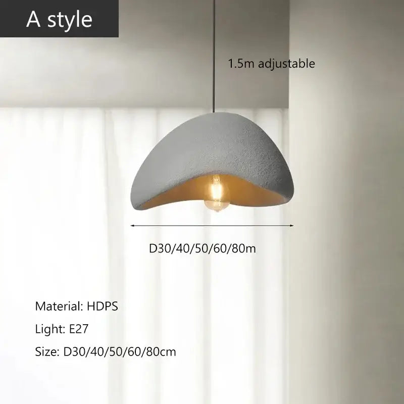 A modern matte gray high-density polystyrene pendant light with warm interior lining for dining room LED bulb use