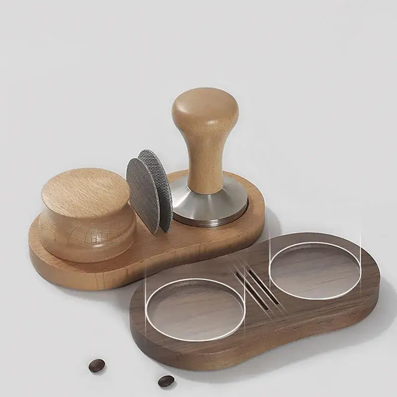 Wooden tamping station with light brown handle stainless steel espresso tamper and matching accessories on dark tray