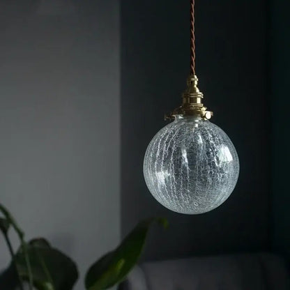 Clear crackled glass led pendant light with warm brass fixture and twisted brown cord for kitchen dining room decorbites cracked glass