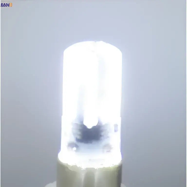 Warm white dimmable g9 led bulb with clear glass housing and metallic base ideal for living room lighting decorbites dimmable