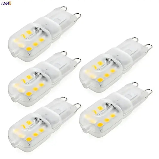Clear glass warm white g9 led corn lights with yellowish leds and metallic contacts for chandeliers and bedrooms
