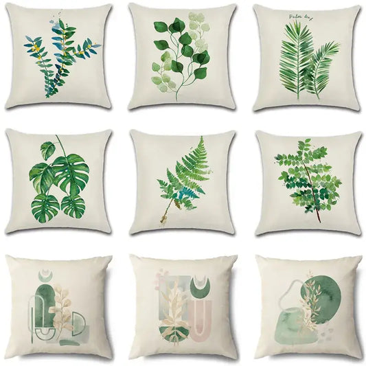 Set of nine cotton pillow cases with green leaves decorative watercolor prints on cream fabric for living room