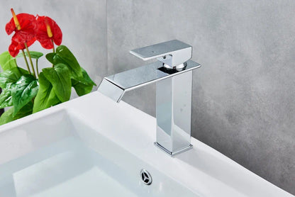 Modern chrome-finished waterfall bathroom faucet single hole with sleek rectangular design and waterfall spout