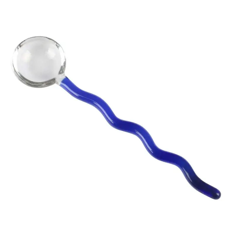 A clear glass spoon coffee stirring rod with a wavy cobalt blue handle for elegant kitchen use