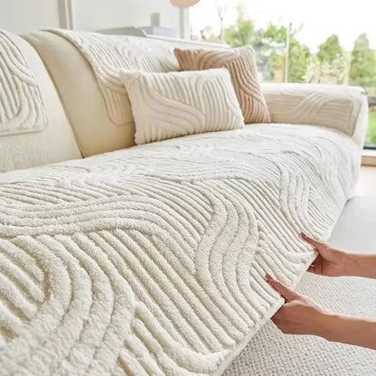 Cream-colored plush sofa cover with a textured wavy ribbed pattern for living room use