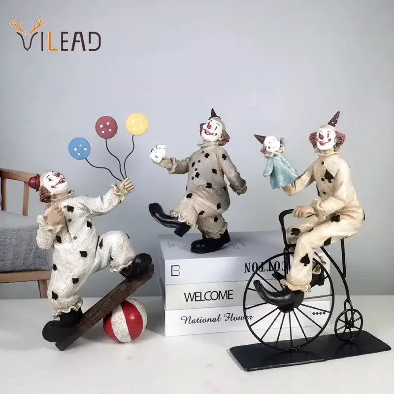 Whimsical cream circus clown joker figurine set with polka-dot costumes featuring skateboard, cards, and vintage bicycle