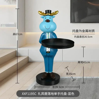 Whimsical blue deer landing tray ornament with gold antlers in a suit holding a black metal tray for living room decor