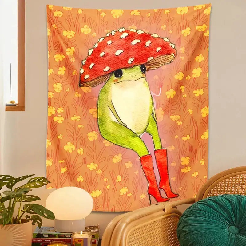 Whimsical orange frog cartoon tapestry featuring a green frog in red boots holding a red mushroom for bedroom decorbites cute frog decor