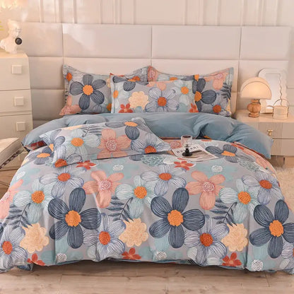 A cozy bedding set with a vibrant floral pattern in blue orange and pink decorbites cotton thickened fabric