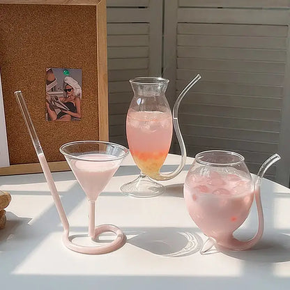 Whimsical pink vampire cocktail glass cup with curved straws in glass drinkware set for dining room decor