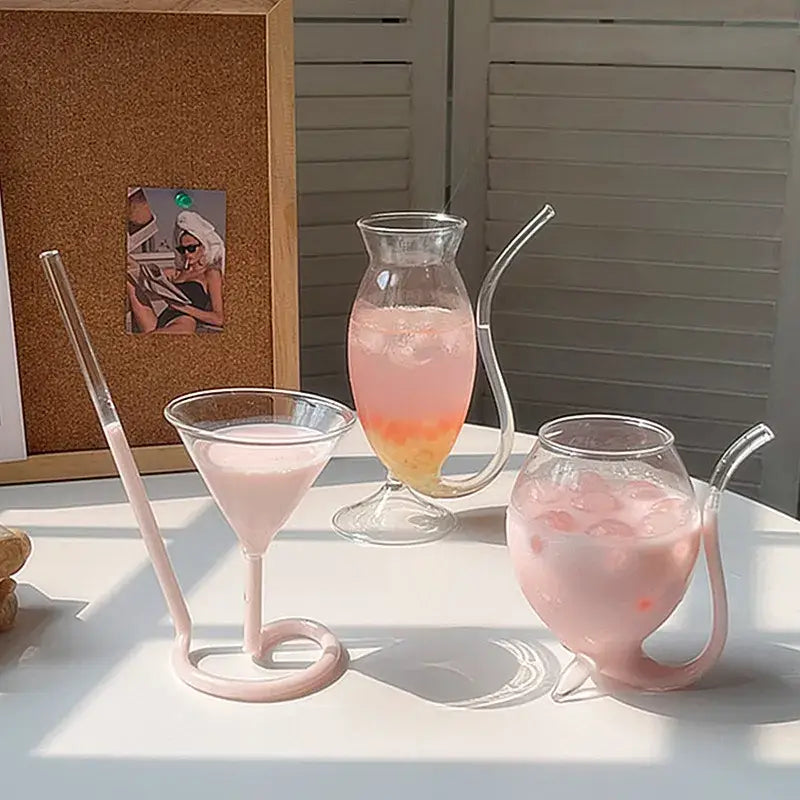 Whimsical pink vampire cocktail glass cup with curved straws in glass drinkware set for dining room decor