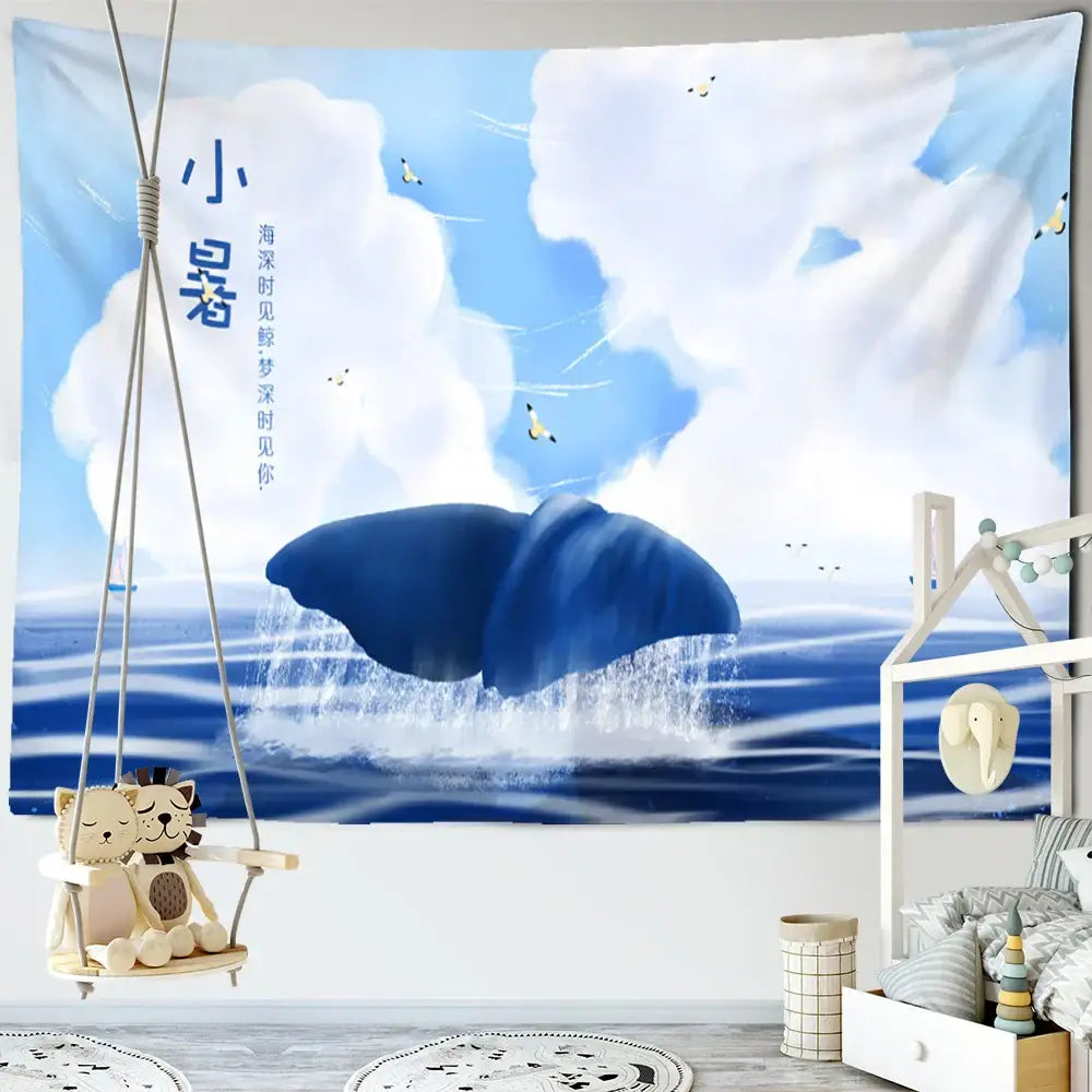 Whimsical teal and white dream whale tapestry wall hanging featuring blue whale tail with clouds and birds decorbites dream whale decor